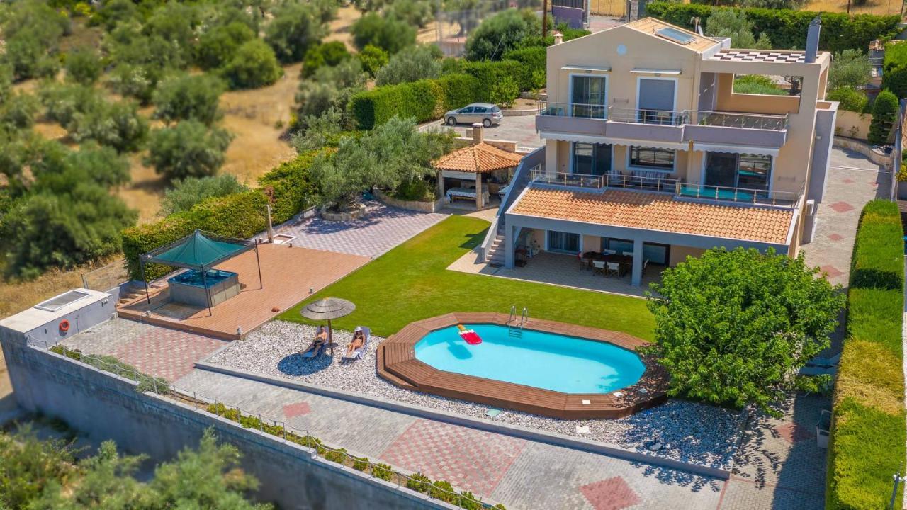 Villa Armonia озеро Вуліагмені Екстер'єр фото
